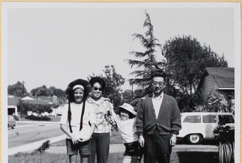 Family standing in yard (ddr-densho-522-106)
