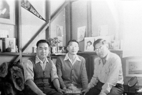 Japanese Americans inside barracks (ddr-densho-15-123)
