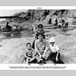 Shizuto Kawamura and three sons sitting on beach (ddr-ajah-6-10)