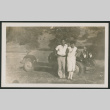 couple in front of car (ddr-densho-378-891)