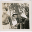 Boy and young man with cigarette (ddr-densho-329-773)