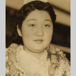 Young woman wearing leis (ddr-njpa-4-1657)