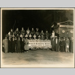 Members of the Japanese Chamber of Commerce pose with a parade float (ddr-densho-395-109)