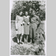 Soldier with two women (ddr-densho-1007-874)