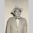 Man wearing a suit and hat (ddr-njpa-2-597)