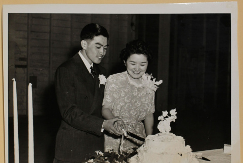 Milton and Molly Cutting the cake (ddr-densho-287-745)
