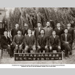 Group of men in suits posing for portrait (ddr-ajah-3-197)