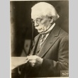 David Lloyd George reading a Document (ddr-njpa-1-1199)