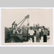 Group around crane in truck bed (ddr-densho-475-303)