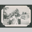 Six men leaning against a car (ddr-densho-471-81)