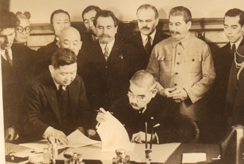 Soviet leaders watching Yosuke Matsuoka sign the Japan-Soviet Neutrality Pact (ddr-njpa-4-897)