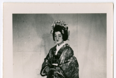 Woman in costume and headpiece (ddr-densho-475-274)