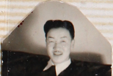Man sitting on couch (ddr-densho-464-129)