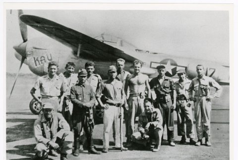 Japanese servicepeople posing with crew of the B-17 and pilots of the P-38s, who landed in Japan a week before surrender (ddr-densho-1007-117)