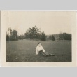 A woman sitting in a field (ddr-densho-296-131)