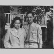 Couple standing outside house (ddr-densho-434-428)