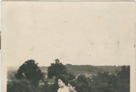 Two women standing in a field (ddr-densho-296-136)