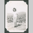 Woman standing in a vegetable field (ddr-densho-463-145)