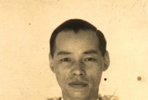 Man wearing leis (ddr-njpa-4-2720)