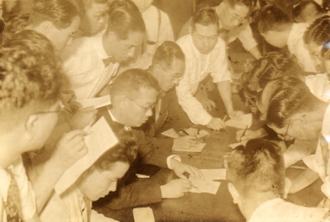 Kiichiro Hiranuma's secretary surrounded by reporters (ddr-njpa-4-1914)