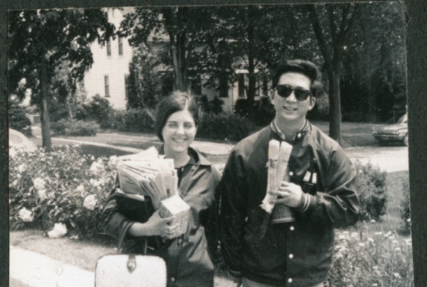 Couple on sidewalk (ddr-densho-523-523)