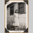 Girl beside a picket fence (ddr-densho-542-221)