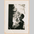 Sally Domoto holding Miki (ddr-densho-329-1286)