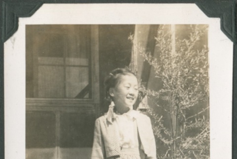 Girl in front of camp house (ddr-densho-321-109)