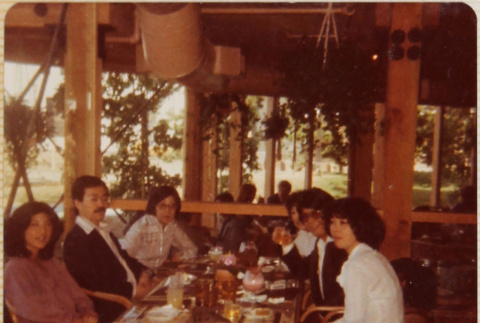 Six people sitting at a table (ddr-densho-426-1325)
