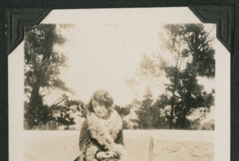 woman sitting on bench (ddr-densho-378-551)