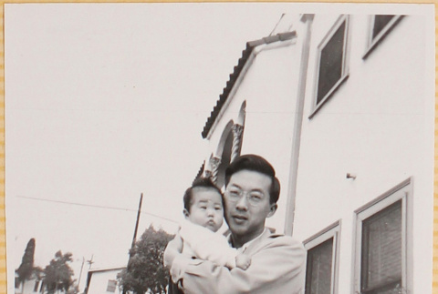Hardy Shiomi holding Susan Shiomi (ddr-densho-522-160)