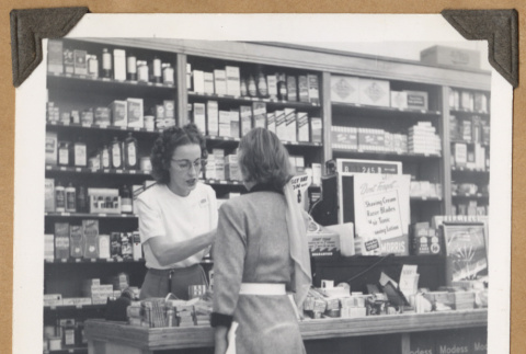 Two women at a shop counter (ddr-densho-542-109)