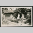 Couple in the garden (ddr-densho-378-345)