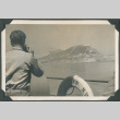 Soldier taking a picture of the Rock of Gibraltar (ddr-densho-201-825)