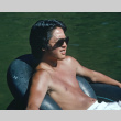 Glenn Osaki floating on the lake (ddr-densho-336-1139)