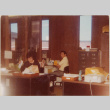 Man and women at work in office (ddr-densho-426-1246)