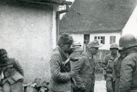 522nd soldiers with captured German soldiers (ddr-densho-22-107)