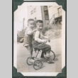 Photo of Paul and Kenji Ima on a tricycle (ddr-densho-483-919)