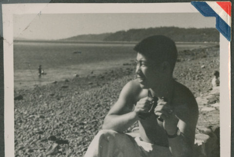 Man sitting on the beach (ddr-densho-201-900)