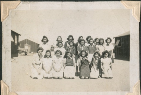 Group photo of young women in camp (ddr-densho-321-37)