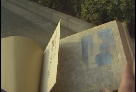 Tokyo b-roll: exterior shots, book (ddr-densho-1007-1730)
