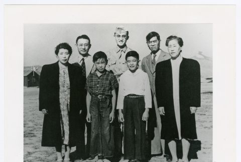 Soldier with family outside camp (ddr-densho-1007-341)