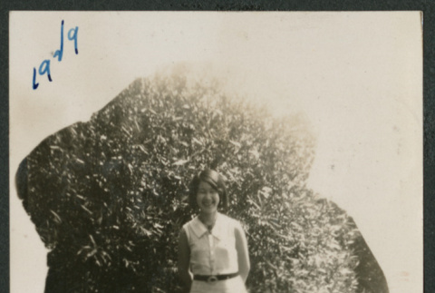 woman on log (ddr-densho-378-635)