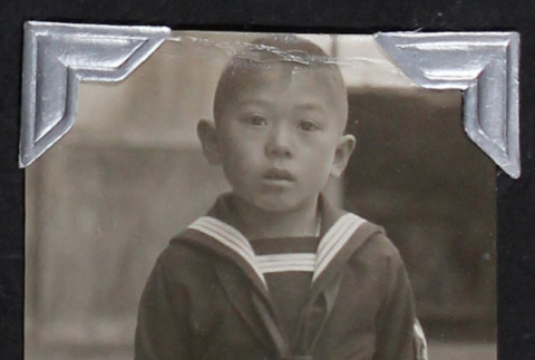 Boy in a school uniform (ddr-densho-404-34)