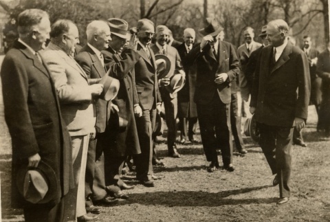 A group of men greeting each other (ddr-njpa-1-1543)