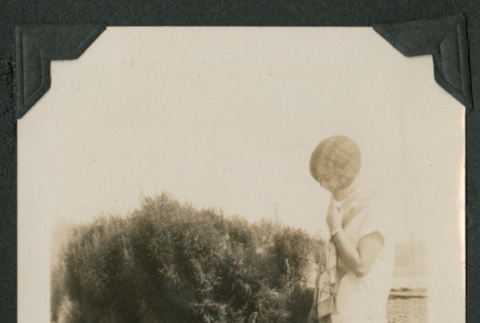 young boy kneeling before a woman (ddr-densho-378-494)