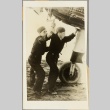 Two men working on a plane (ddr-njpa-13-867)
