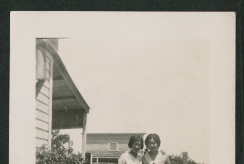 2 women in a yard (ddr-densho-378-826)