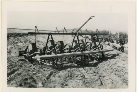 Rear view of a seed planter (ddr-densho-37-1319)