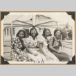 Four girls on a merry-go-round (ddr-densho-542-194)